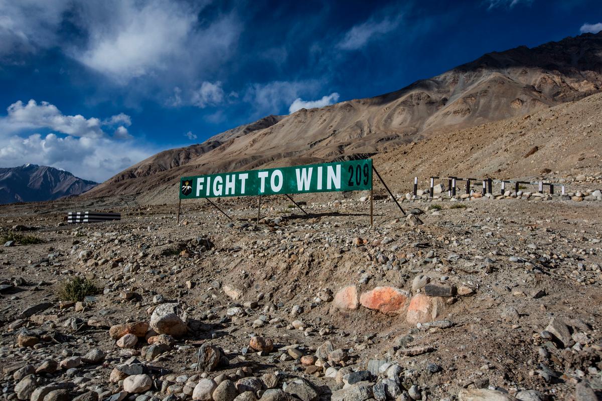 An Indian Military banner post is seen on the road to Pangong Lake on Oct. 5, 2012 (Daniel Berehulak/Getty Images)