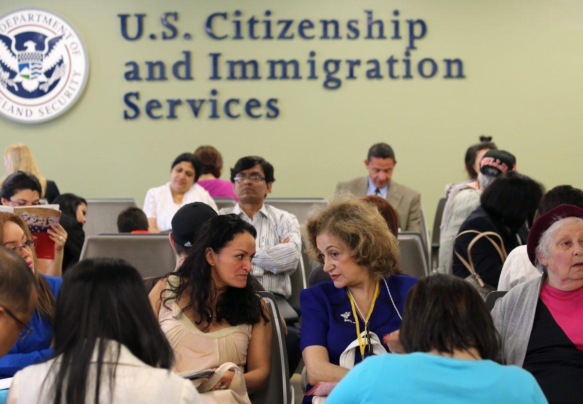 Immigrants await their turn for green card and citizenship interviews at the U.S. Citizenship and Immigration Services Queens office in Long Island City, N.Y., on May 30, 2013. (John Moore/Getty Images)