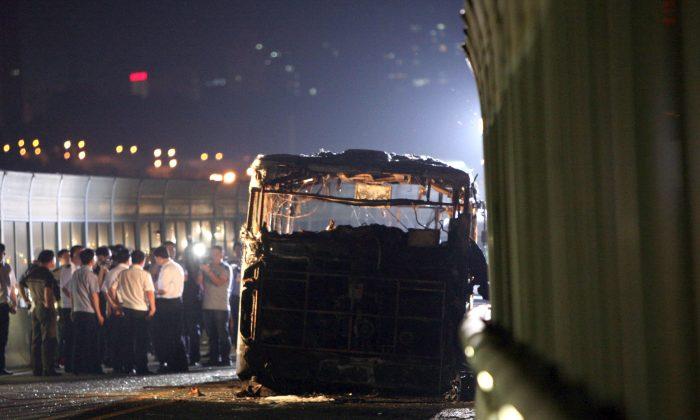 Burned Bus in China Sparks Online Discussion, and Criticism