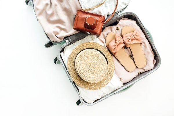Packing to travel. (Shutterstock)