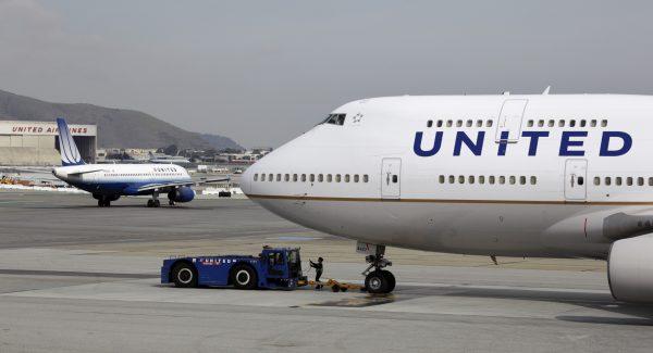 United Airlines planes taxiing at San Francisco International Airport on Feb. 23, 2011. (AP Photo/Eric Risberg)