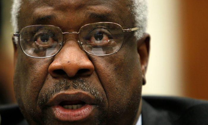 Justice Thomas Asks Questions in Court, 1st Time in 10 Years