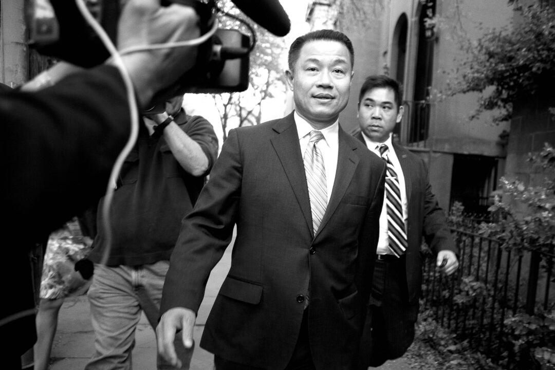 John Liu on Defensive Over Bloomberg’s Lawsuit