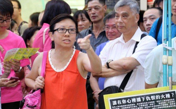 Hong Kong Teacher Who Scolded Police Penalized