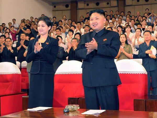 North Korean leader Kim Jong Un (C), accompanied by wife Ri Sol-Ju on July 6, 2012. (KNS/AFP/GettyImages)