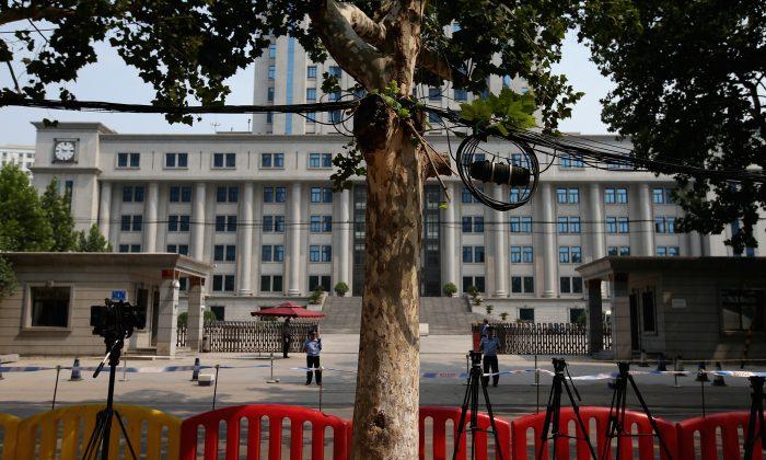  Security and Surveillance Tighten Up as Bo Xilai Stands Trial 