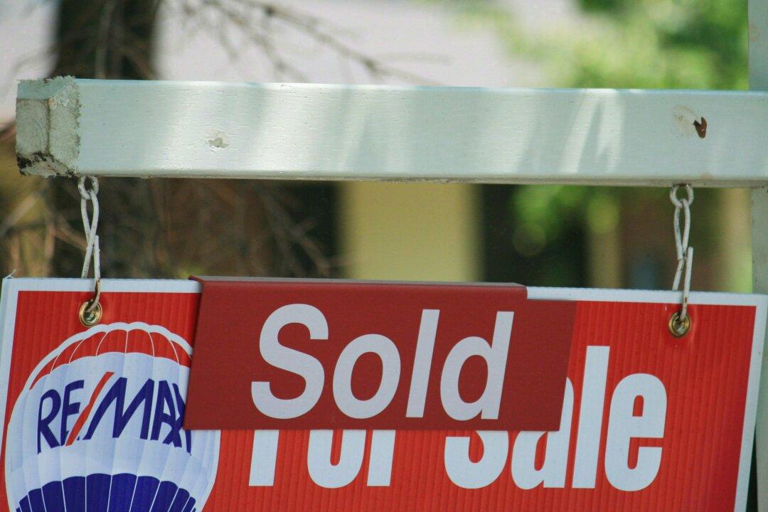 CMHC Takes Steps to Curtail Growth in Housing Market