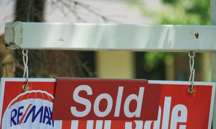 CMHC Takes Steps to Curtail Growth in Housing Market