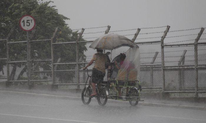 Typhoon Utor Heads for China After Slamming Philippines