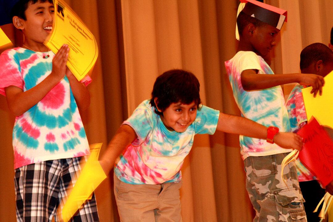 Refugee Kids Transition to New Ground at Graduation Ceremony