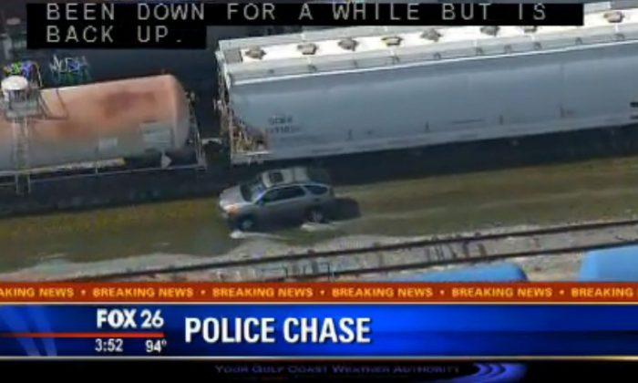 Houston: Police Chase Car Through Residential Area, Train Yard (Live Stream)
