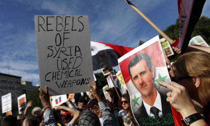 Looming Syria Vote Prompts Protests