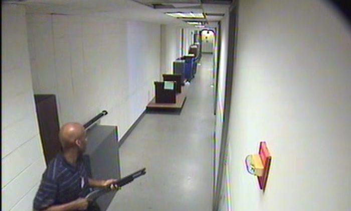 Aaron Alexis: Photos Released by FBI Show Navy Yard Shooter Enter Building, Armed with Shotgun (+Video)