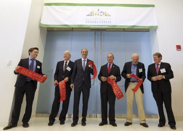 Chairman of the scientific steering committee of the New York Genome Center Tom Maniatis (2nd L), president and scientific director Robert B. Darnell (3rd L), New York City Mayor Michael Bloomberg (3rd R), board of directors Jim Simons (2nd R), and Russ Carson, cut the ceremonial ribbon during the opening of New York Genome Center, on Sept. 19, 2013. (Mary Altaffer/AP)