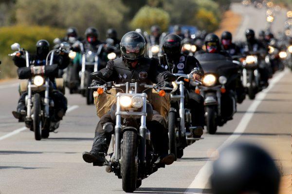 Members of the Rebels motorcycle gang ride to Perth on September 12, 2013 in Australia. Victoria, Queensland and New South Wales are cracking down on bikie gangs with new laws and a national anti-gangs squad. (Paul Kane/Getty Images)