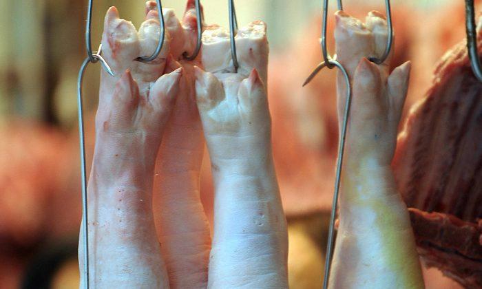 Chinese Official Suspended for $115,000 Pigs Trotter Tab