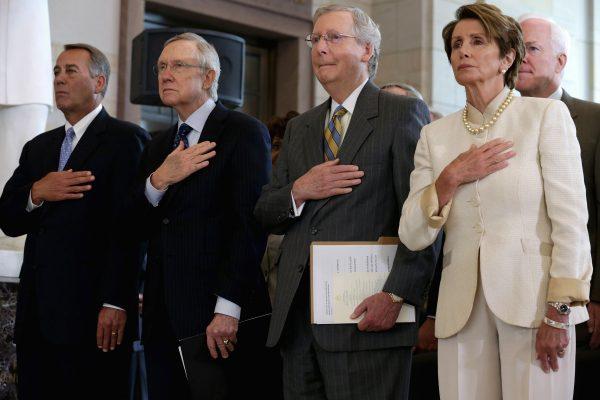 (L-R) John Boehner (R-Ohio), Harry Reid (D-Nev.), Mitch McConnell (R-Ky.), Nancy Pelosi (D-Calif.), and Sen. John Cornyn (R-Tex.) in Washington, on July 18, 2013. (Chip Somodevilla/Getty Images)