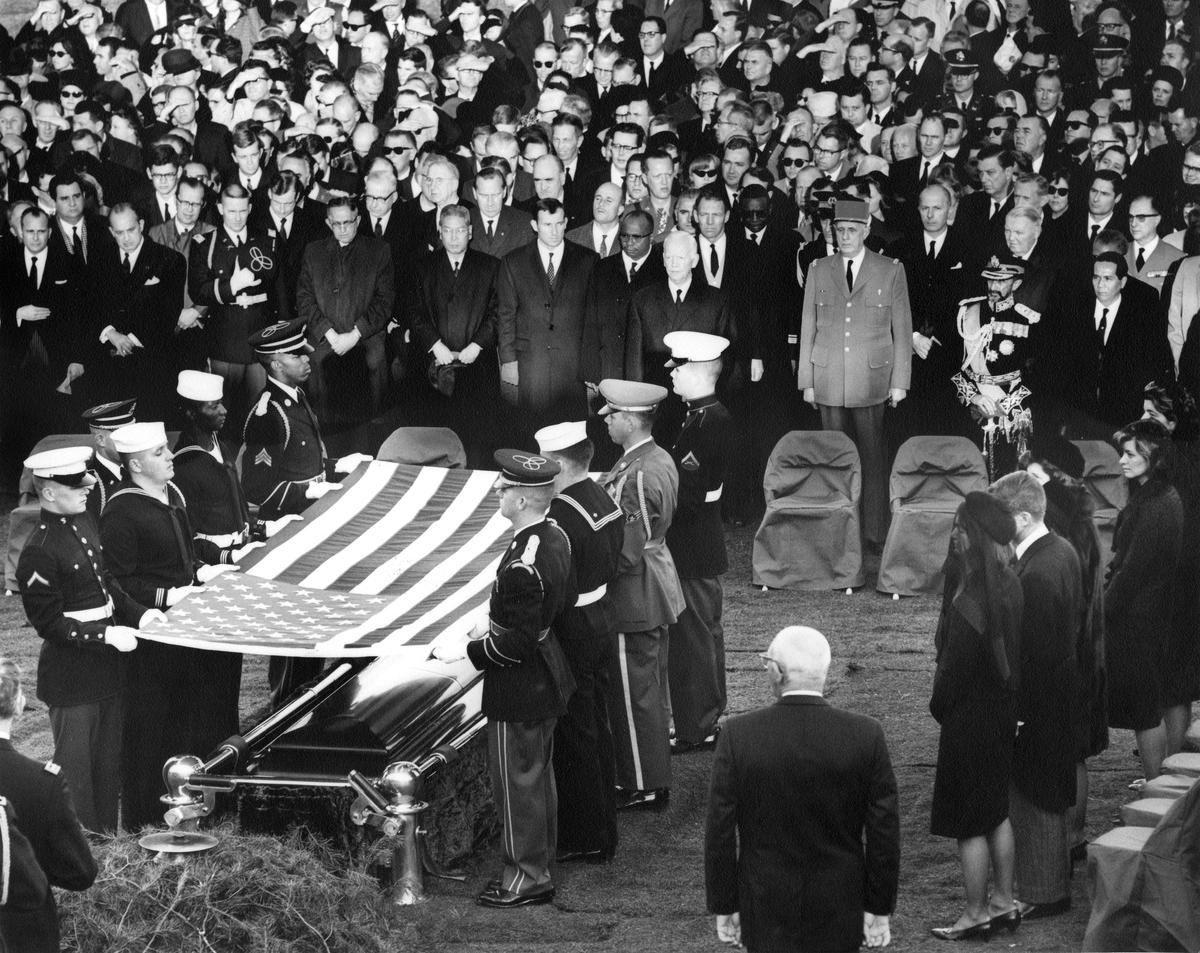 Burial and folding of the flag ceremony for President John F. Kennedy (Abbie Rowe, National Parks Service/John F. Kennedy Presidential Library and Museum, Boston)