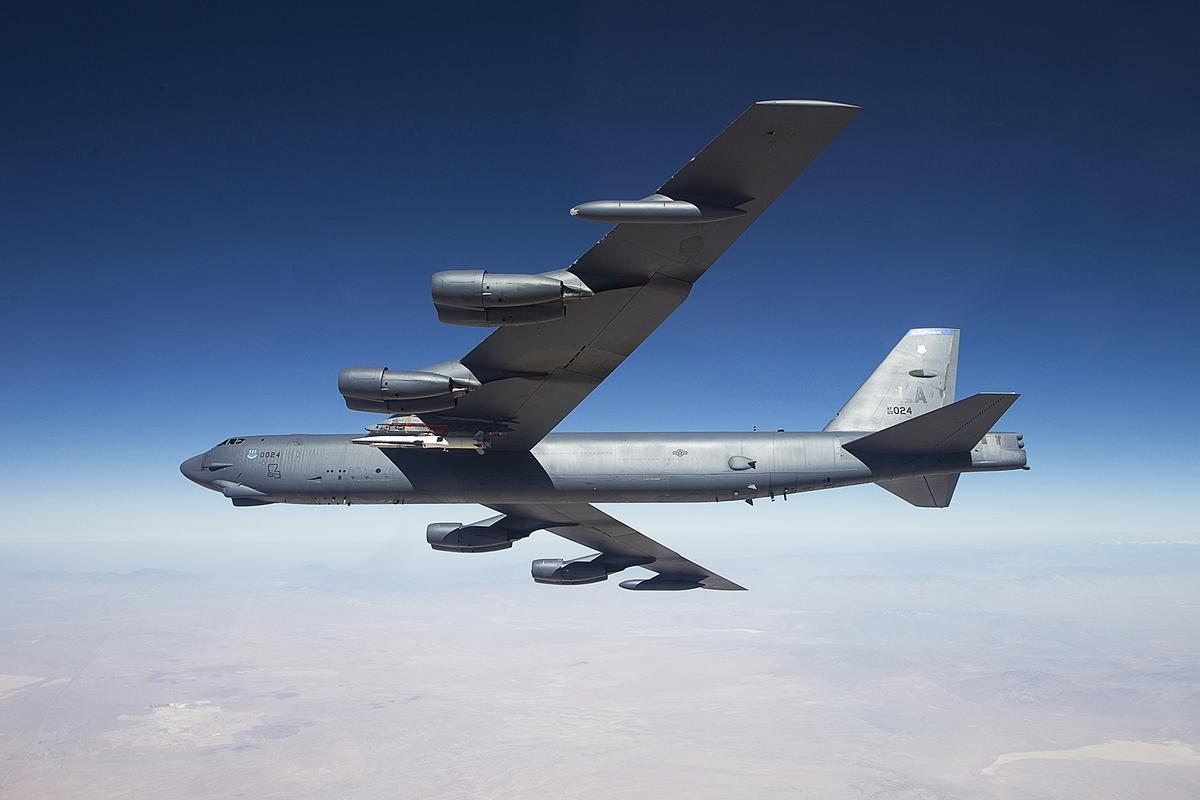 The X-51A WaveRider, attached to the inner wing of a B-52 Spirit, flew its fourth and final mission May 1, 2013, over the Point Mugu Naval Air Warfare Center Sea Range in California. (U.S. Air Force photo/Bobbi Zapka)