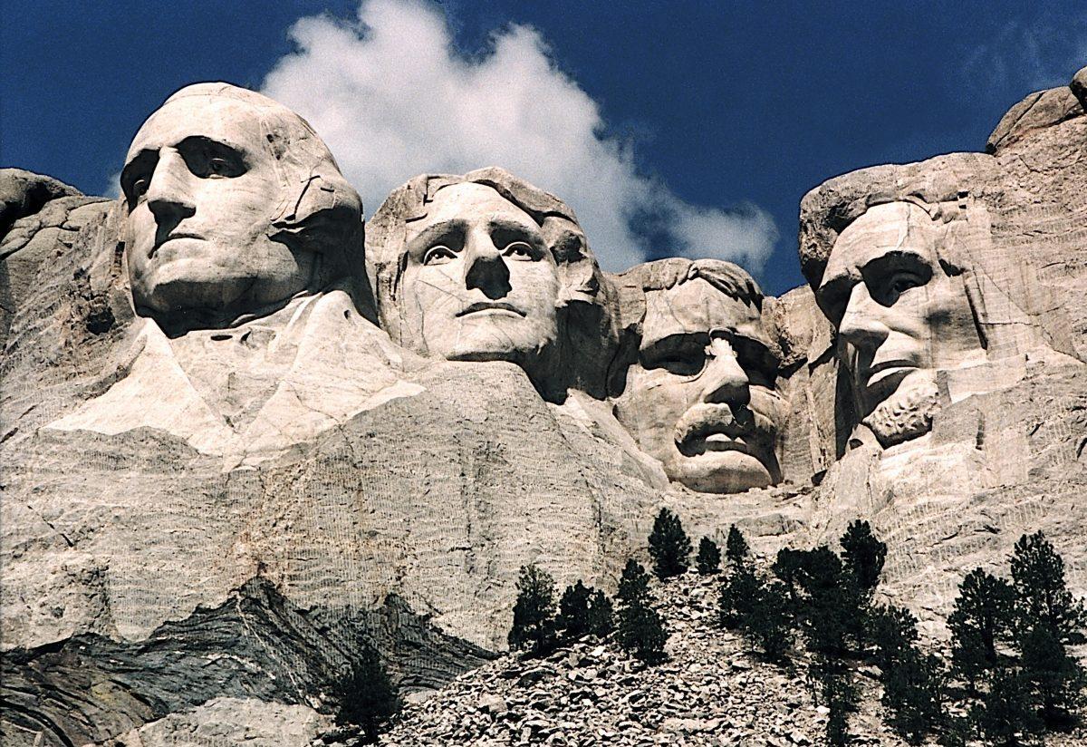 Mt. Rushmore, in Keystone, S.D. The presidents were selected on the basis of what each symbolized. George Washington (L) represents the struggle for independence; Thomas Jefferson (2nd L), the idea of government by the people; Theodore Roosevelt (2nd R), for the 20th-century role of the United States in world affairs; and Abraham Lincoln (R) for his ideas on equality and the permanent union of the states. (Karen Bleier/AFP/Getty Images)