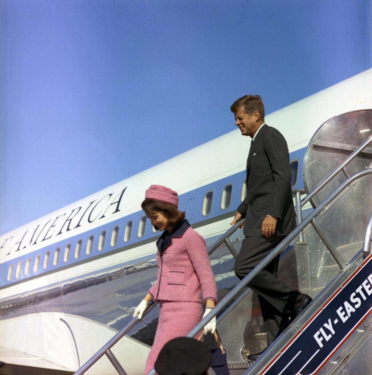 President and Mrs. Kennedy descend the stairs from Air Force One at Love Field in Dallas on Nov. 22, 1963. (Cecil Stoughton/John F. Kennedy Presidential Library and Museum, Boston)
