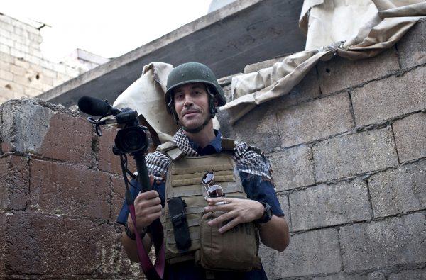 In this November 2012, file photo, posted on the website freejamesfoley.org, shows missing journalist James Foley while covering the civil war in Aleppo, Syria. American freelance journalist Foley disappeared in November 2012. Behind a veil of secrecy, at least 30 journalists have been kidnapped or have disappeared in Syria—held and threatened with death by extremists or taken captive by gangs seeking ransom. (AP Photo/Nicole Tung, freejamesfoley.org, File)