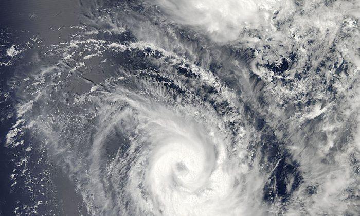 Tropical Cyclone Amara Beings Heavy Rain and is Forecasted to Strengthen
