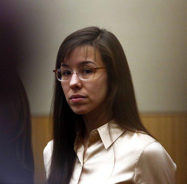 Jodi Arias looking at the family of Travis Alexander as the jury arrives during the sentencing phase of her trial at Maricopa County Superior Court in Phoenix on May 15, 2013. (AP Photo/The Arizona Republic, Rob Schumacher, File)
