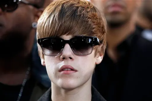 Justin Bieber arrives at the MTV Video Music Awards in Los Angeles on Sept. 12, 2010. (AP Photo/Matt Sayles)