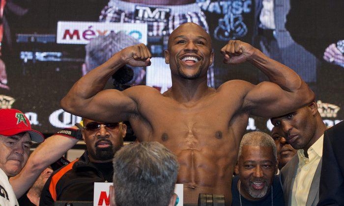 Floyd Mayweather Jr. Doesn’t Respond After Ronda Rousey Claims She Could Beat Him