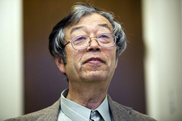 Dorian S. Nakamoto smiles during an interview in Los Angeles on March 6, 2014. (Damian Dovarganes/AP Photo)