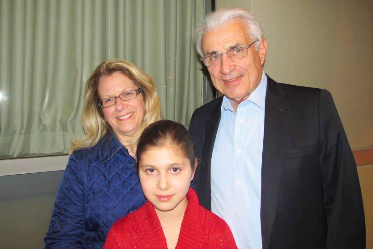 Robert C. Waggoner, with his wife, Mary Ellen, and their daughter at the New Jersey Performing Arts Center in Newark, N.J., on April 12, 2014. (Wei Yong/Epoch Times)