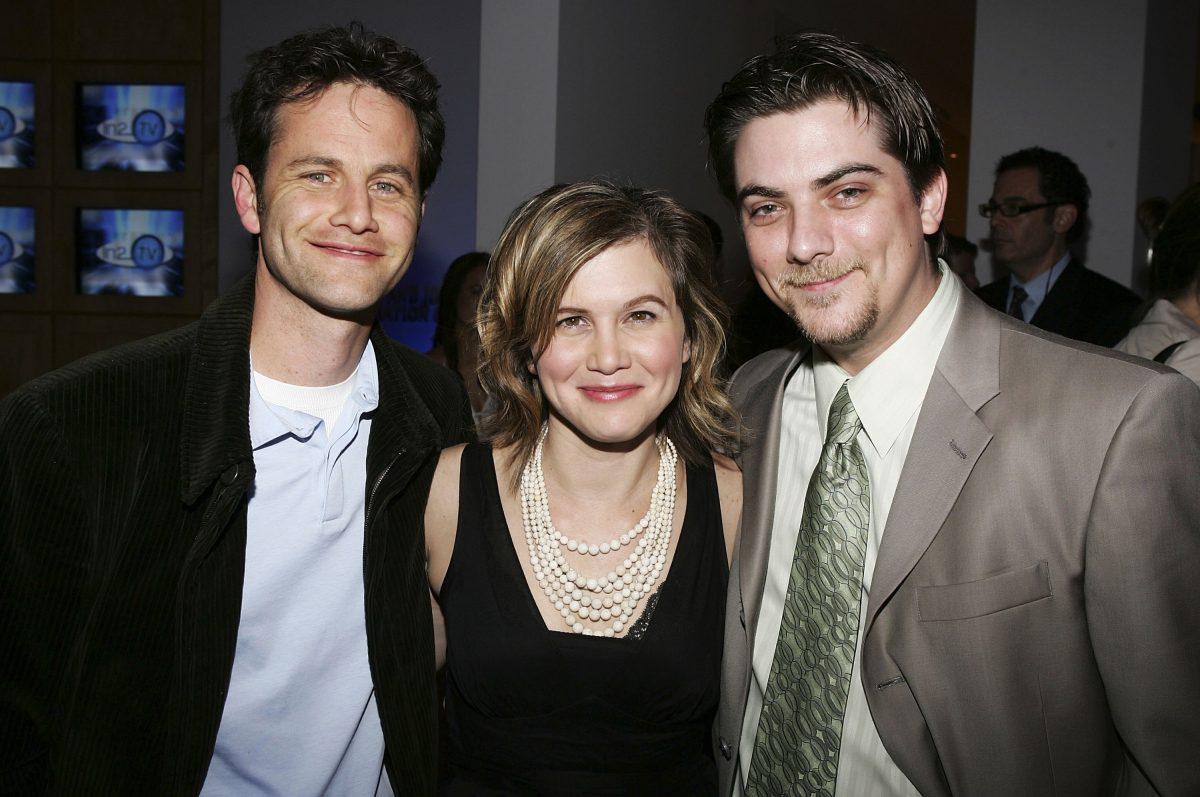 Jeremy Miller (R) with fellow "Growing Pains" stars Kirk Cameron (L) and Tracey Gold (C) in a 2006 file photo. (Frazer Harrison/Getty Images)