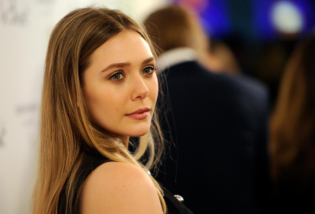 ‘Avengers: Age of Ultron’ Cast Member Elizabeth Olsen Terrified to Spill Secrets (+Photos)