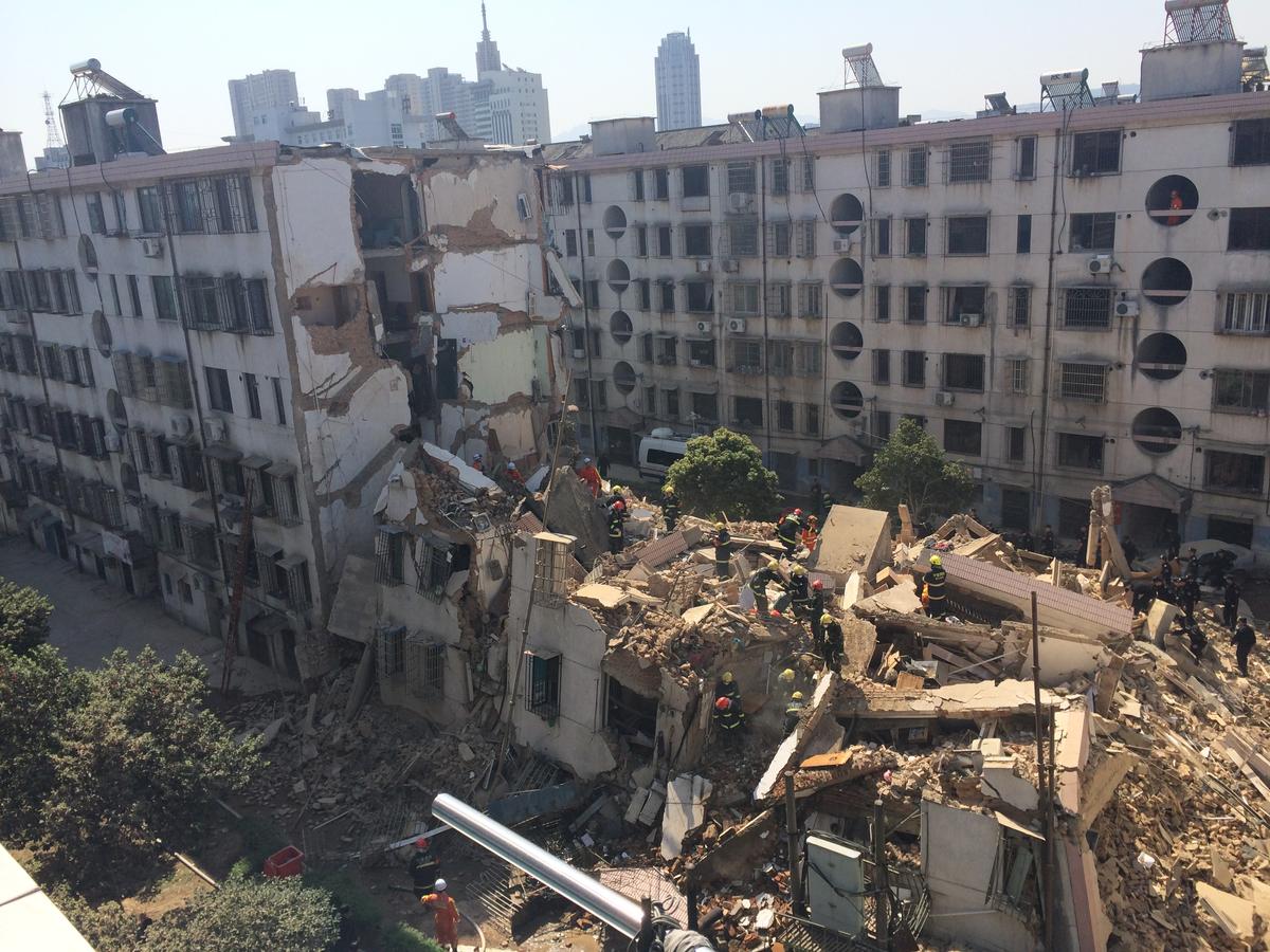A collapsed residential building in Fenghua city, Zhejiang Province, on April 4, 2014. (ChinaFotoPress via Getty Images)