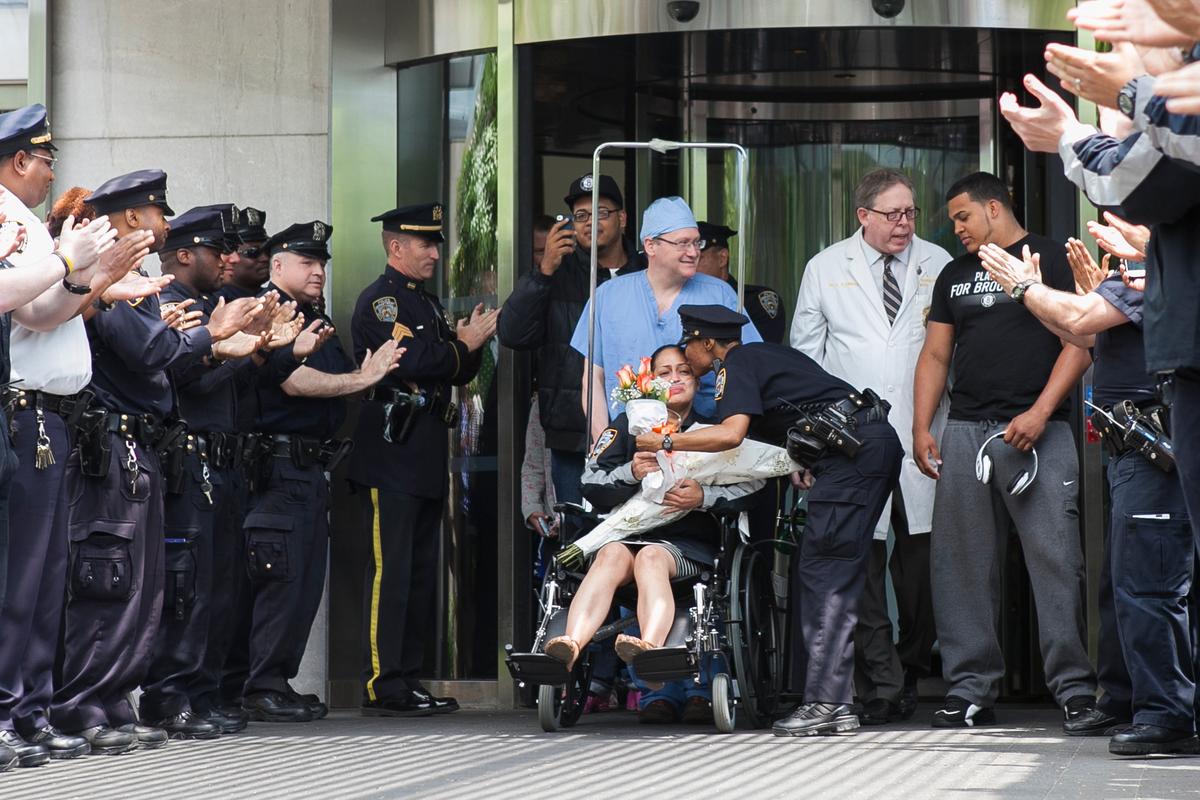 Police Officer Injured in Fire Discharged From Hospital