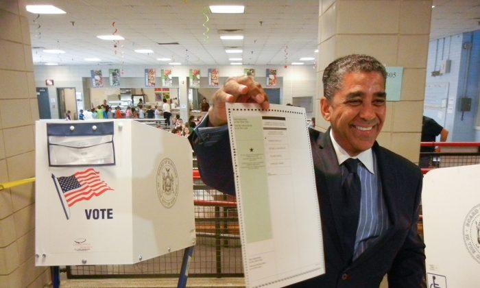 Accompanied by Family, Espaillat Casts Vote for Himself
