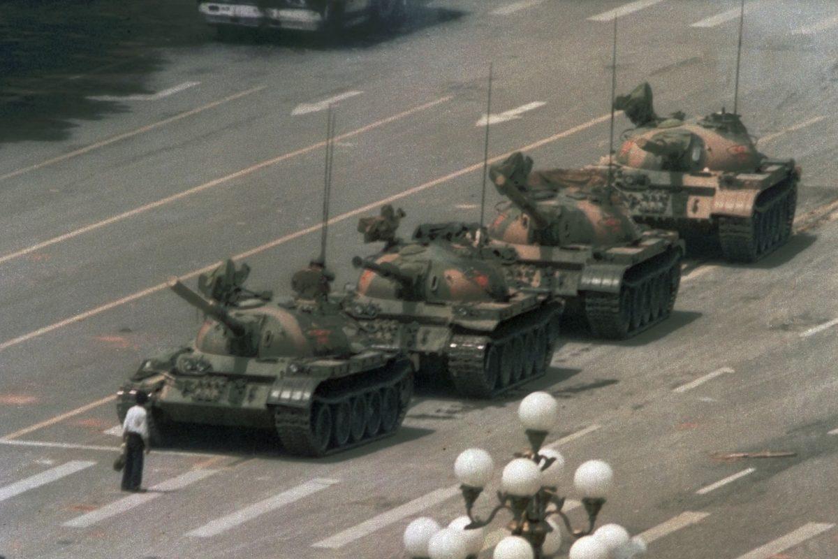 "Tank Man": This image is how most of the world remembers the Tiananmen Square Massacre. The Chinese regime has been trying to have people forget about it by censoring discussions and having 1989 banned from textbooks and Chinese websites. (AP Photo/Jeff Widener)