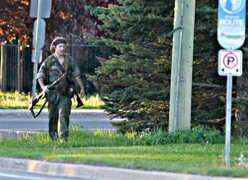 Justin Bourque Arrested: Moncton, Canada Shooting Suspect Taken Into Custody; Not Dead