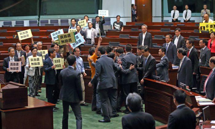 Pan-Democrats Walk Out on Hong Kong Chief Executive