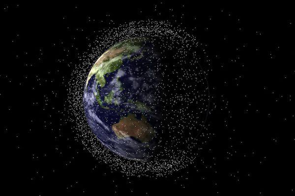 Australian researchers are calling for a step up in the regulation of space activities amidst the rapidly evolving commercial use of space and growing reports of space debris found in several places around the globe. Image shows the Earth surrounded by satellites and space junk. (EOS Space Systems)