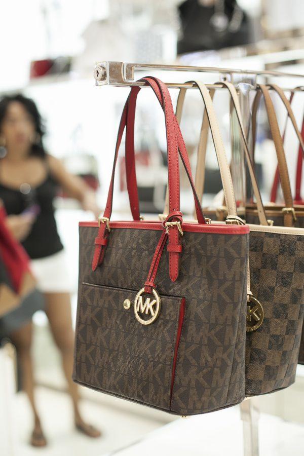 A Michael Kors handbag is on display at Macy's 34th Street store which looks very similar to Louis Vuitton designs, in Manhattan, on Aug. 4, 2014. (Samira Bouaou/The Epoch Times)