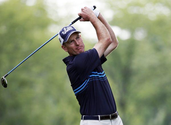 Jim Furyk watches his tee shot on the 12th hole during the first round of the PGA Championship golf tournament at Valhalla Golf Club in Louisville, Ky., on Aug. 7, 2014. (Mike Groll/AP Photo)