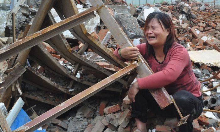 In China, Couple Held in Cemetery While Home Demolished