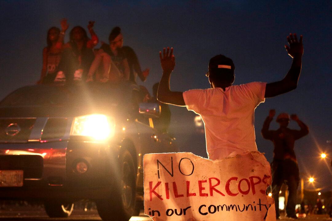 Darren Wilson Photos, Michael Brown Video from Local Piaget Crenshaw Both Emerge Over the Weekend