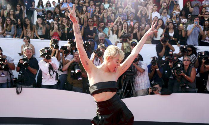 Why Miley Cyrus Let Her Homeless Friend Accept Biggest Award at MTV VMAs