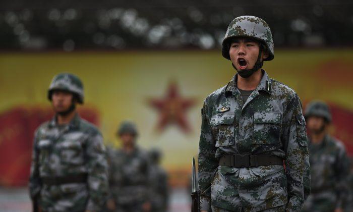 As Communist China Grows Weaker, It Puts On a Bigger Show of Force
