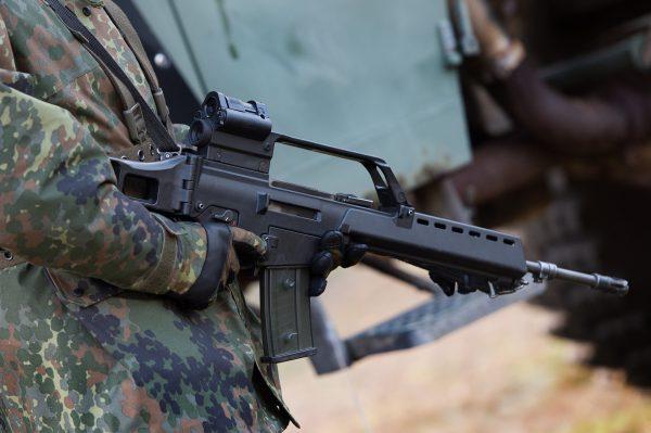 A German soldier holds a Heckler & Koch G36 assault rifle at a military training ground on Feb. 13, 2014, near Weisskeissel, Germany. (AP Photo/Arno Burgi)