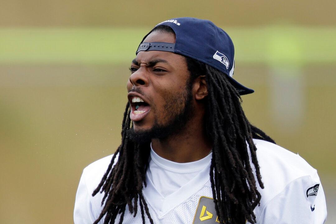 Richard Sherman Uses Doug Baldwin Cardboard Cutout to Mock NFL Policies