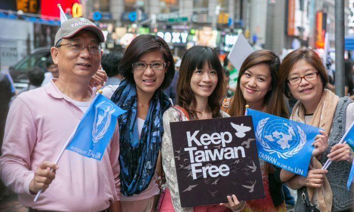 Old Pass Torch to Young as Rally Demands ‘Keep Taiwan Free’